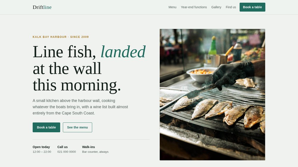Home page of the Driftline demonstration website: a restaurant site with a grilled fish photograph, a booking button and a clear menu link
